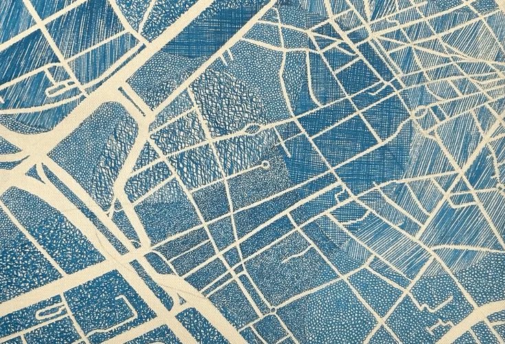 Hand-carved blue print of a city street map